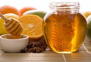 fresh honey with honeycomb, spices and fruits
