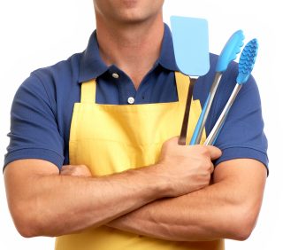 A young man prepares to barbeque