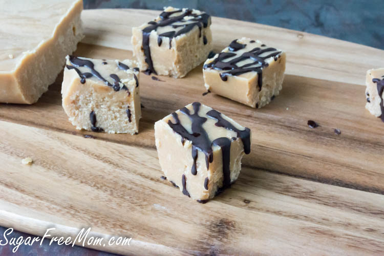 squares of fudge with chocolate drizzled on top