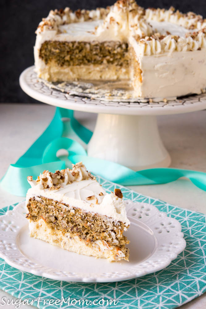 This beautiful Low Carb Keto Carrot Cake is layered between creamy cheesecake and cream cheese frosting! This pretty cake is Nut Free, Gluten Free, Sugar Free and Grain Free. Just 5 grams of net carbs!