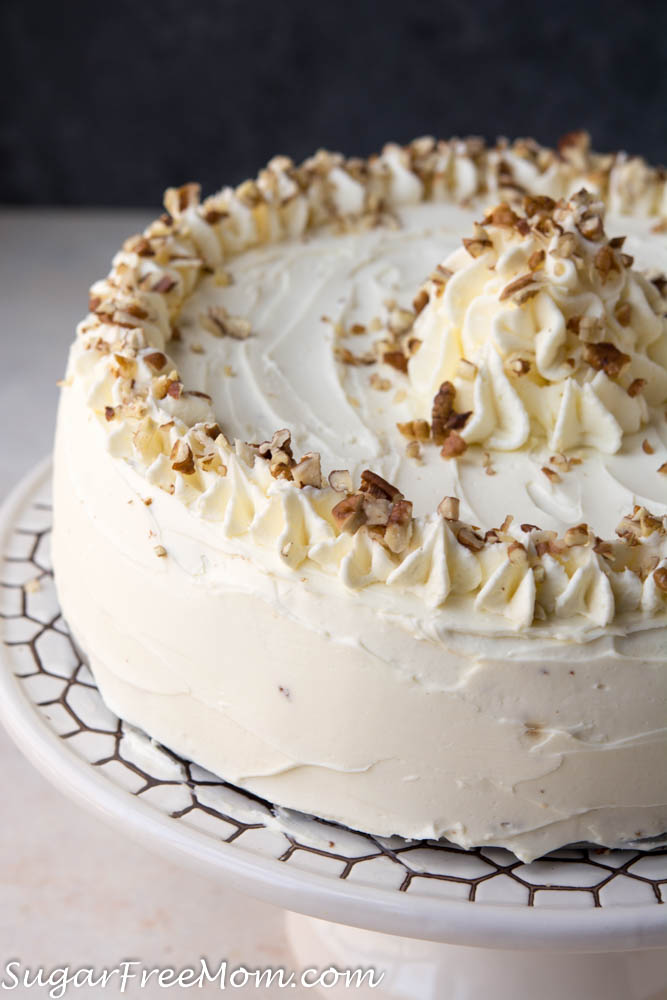This beautiful Low Carb Keto Carrot Cake is layered between creamy cheesecake and cream cheese frosting! This pretty cake is Nut Free, Gluten Free, Sugar Free and Grain Free. Just 5 grams of net carbs!