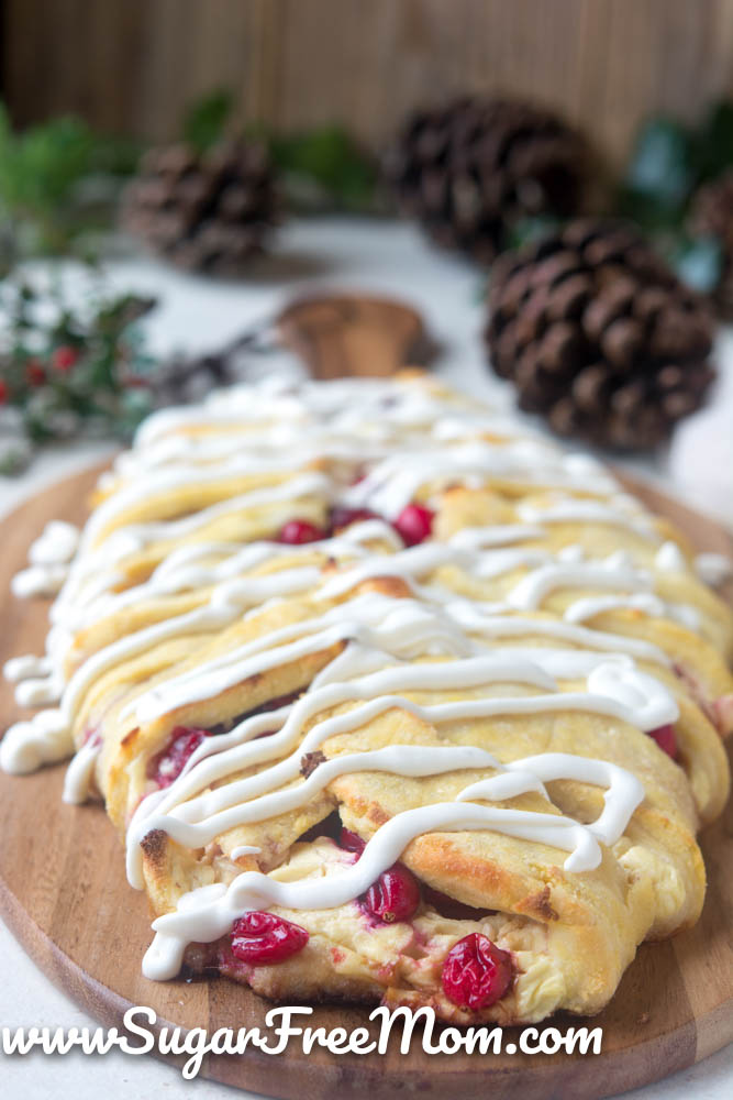This is Low Carb Keto Cranberry Cream Cheese Danish is sugar free, gluten free, and made with an easy fathead dough recipe that is almond flour free! This keto cranberry cheese danish recipe is perfect for the holiday season!