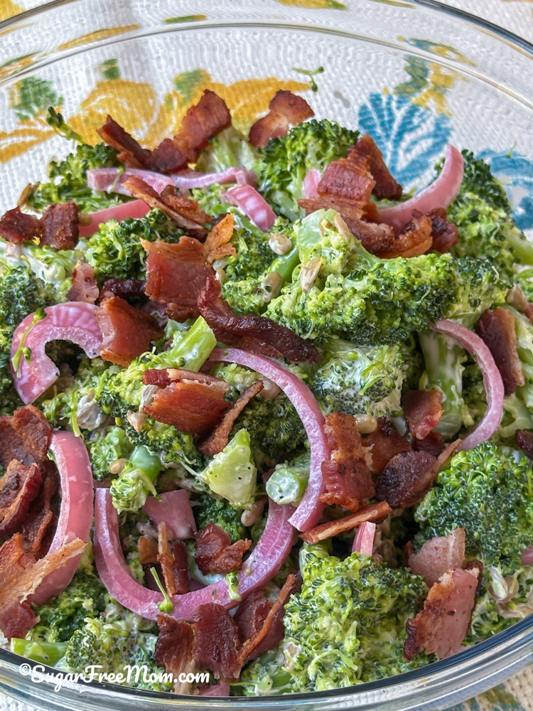 close up vertical pic of keto broccoli salad with bacon