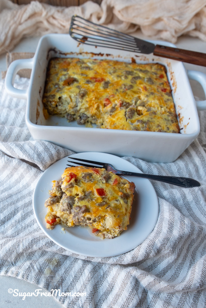 plate of breakfast casserole next to serving dish