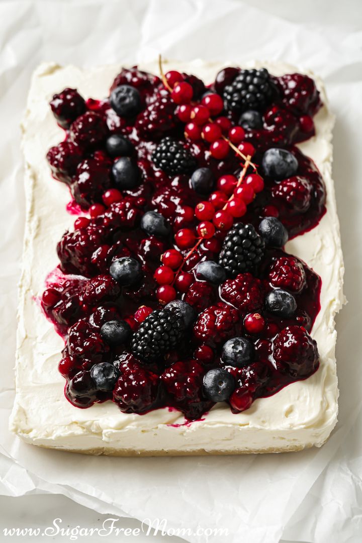 overhead view of a cheesecake dessert with fresh berry mixture on top