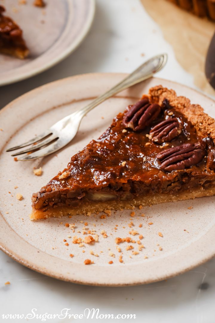 pecan pie with a few slices cut out