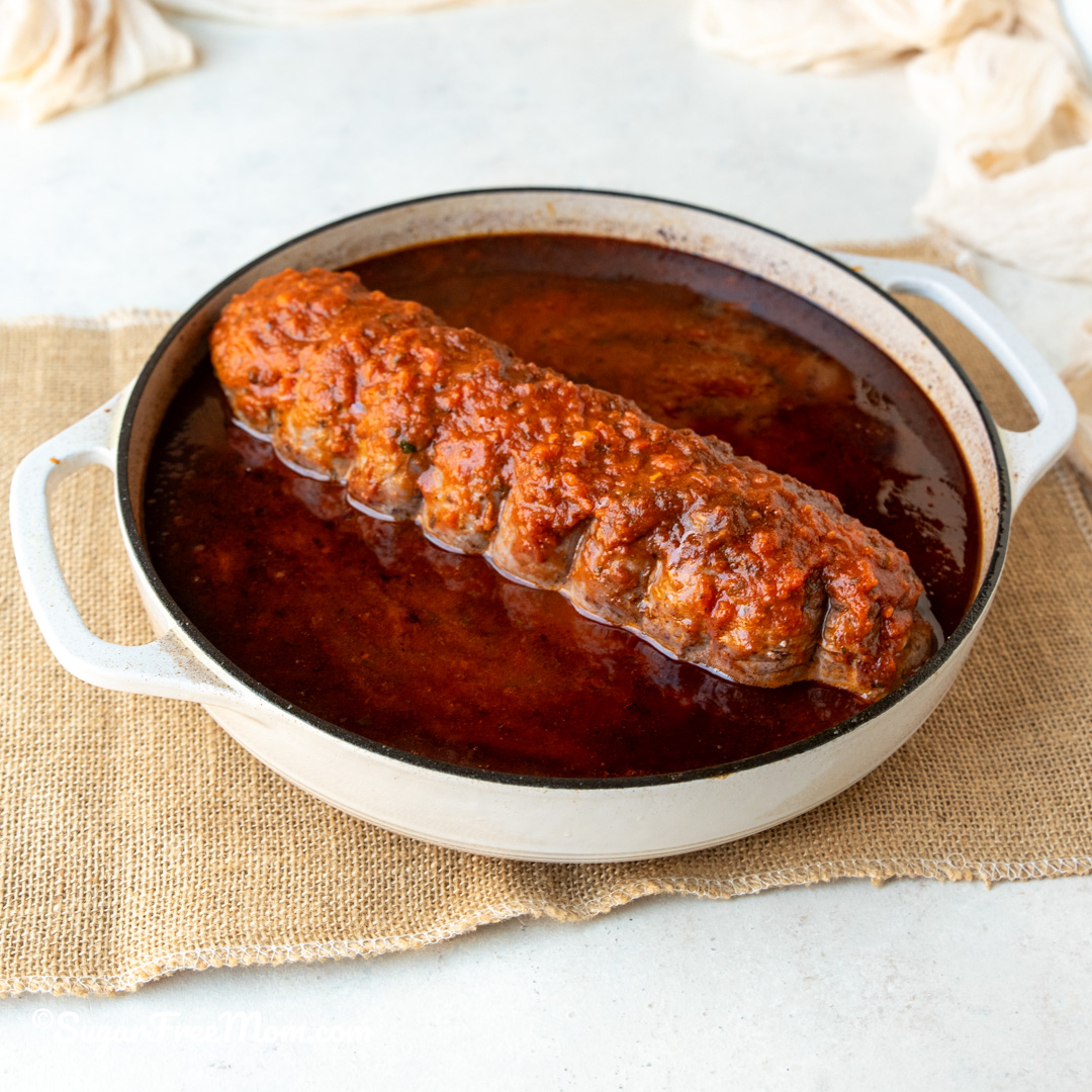 This keto Italian Braciole recipe is perfect Italian food for a special occasion holiday! It's essentially a stuffed flank steak with Sicilian flavors and easier to make than you think!