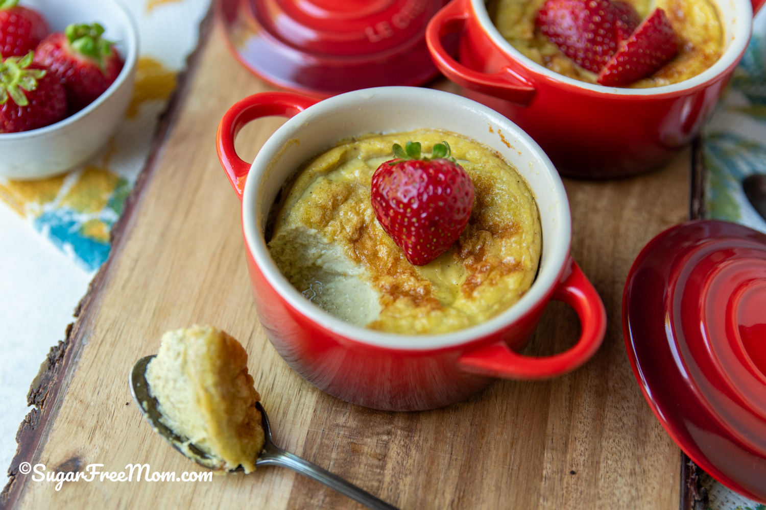 Creamy dairy free keto coconut custard with strawberries and silky smooth texture.