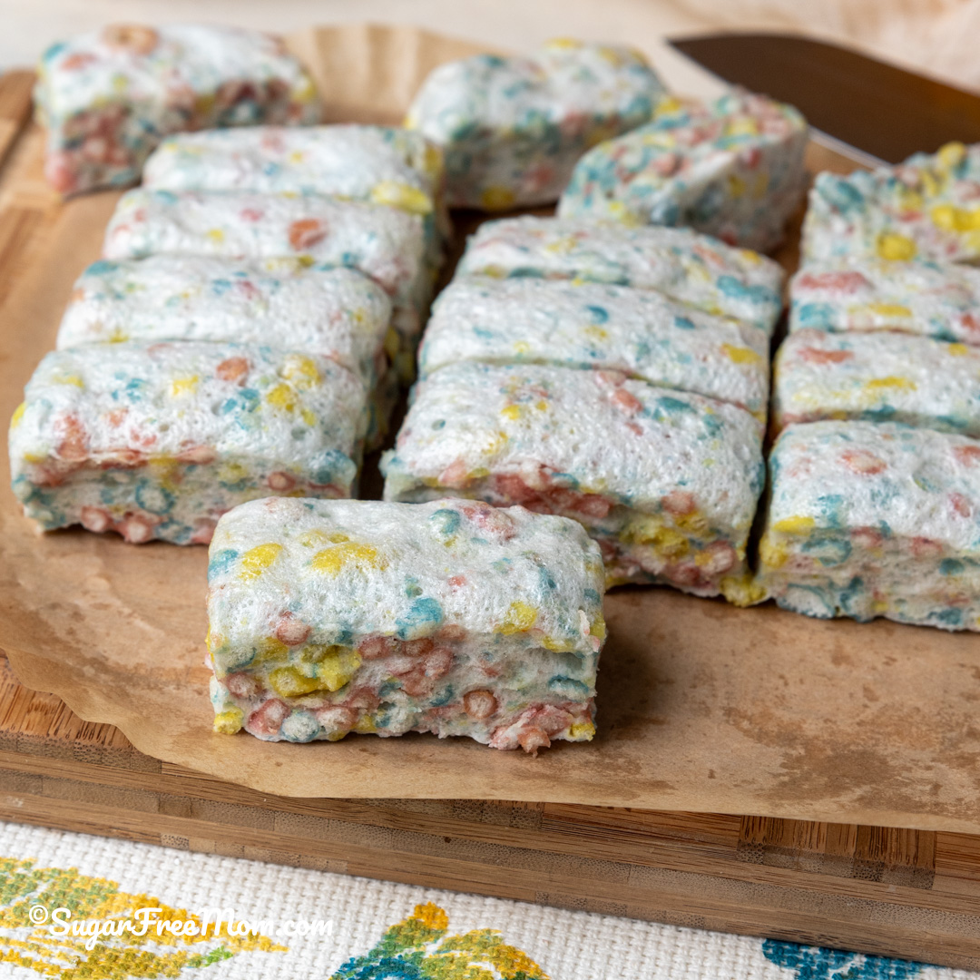 square image of multiple slices of keto marshmallow rice krispie treats